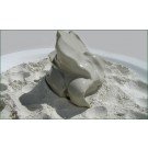 Hydrated green Desert clay on a bed of dry clay powder